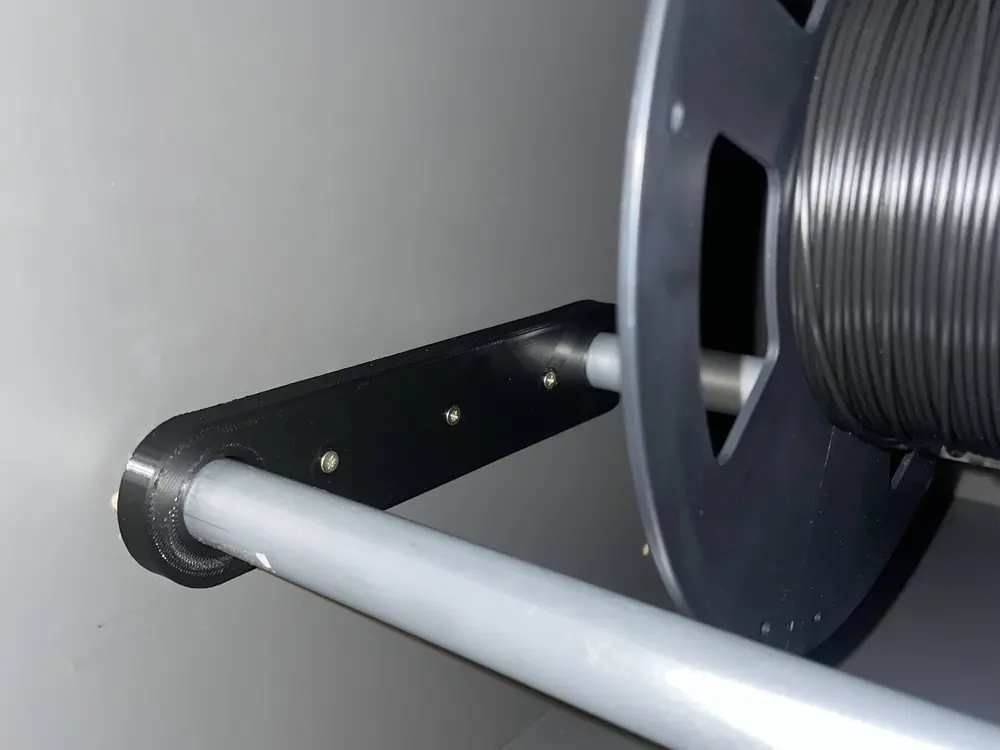 Simple spool holder for cupboard