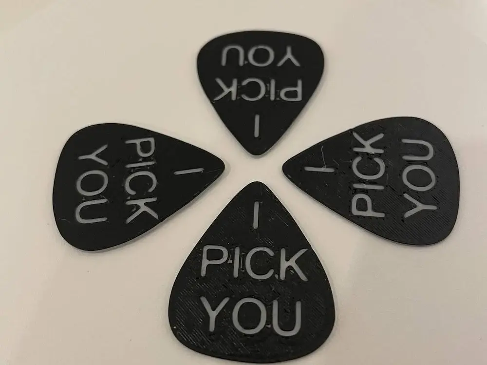 Guitar picks with quote