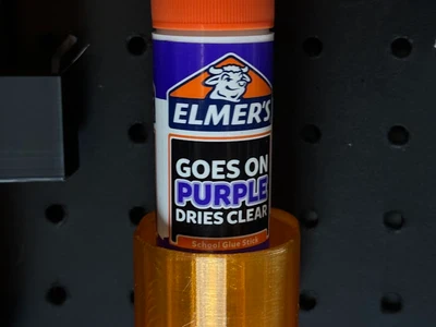 Glue stick holder for pegboard