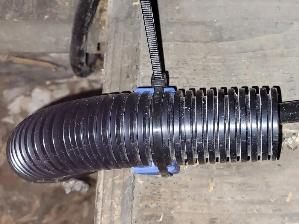 Flexible conduit holder 40