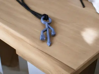 Pendant with USB symbol
