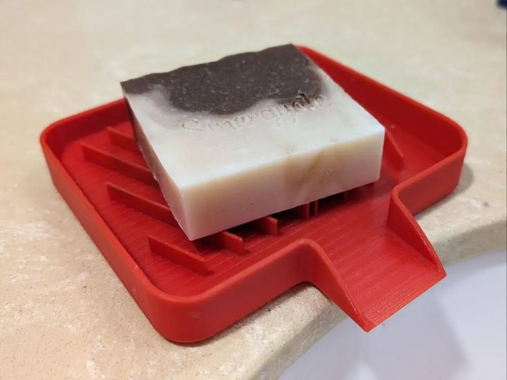 Soap dish drainer with drain