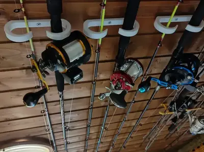Fishing rod cealing holder