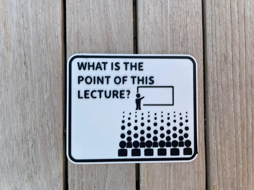 University "What is the point of this lecture?" Sign