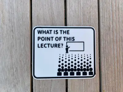University "What is the point of this lecture?" Sign