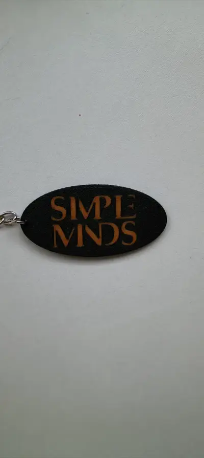 llavero de Simple Minds