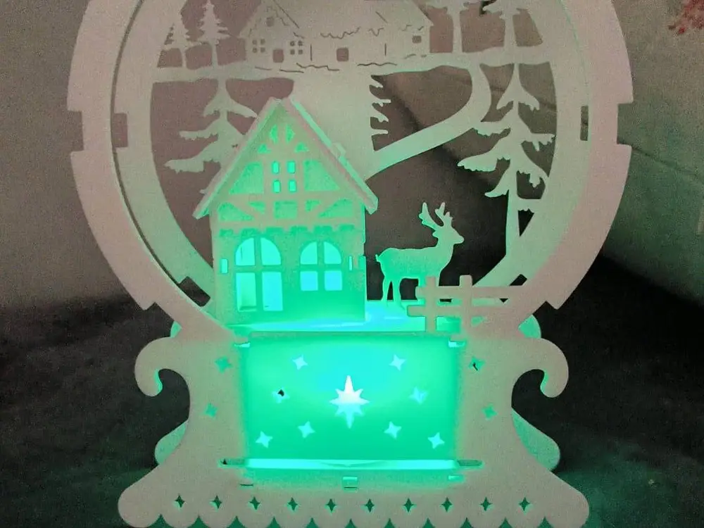 Kit for the construction of a Christmas house with candle