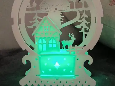 Kit for the construction of a Christmas house with candle