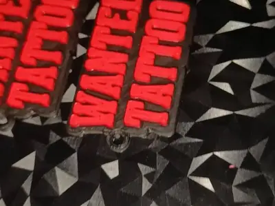 keycahin wanted tattoo