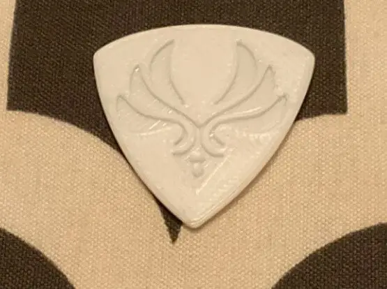 Púa triangular