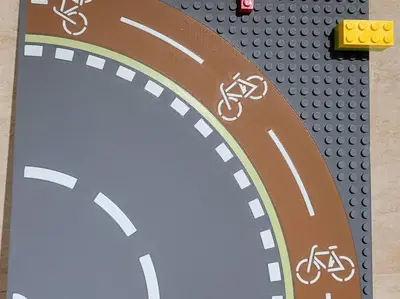 Lego base plate with curved cycle path