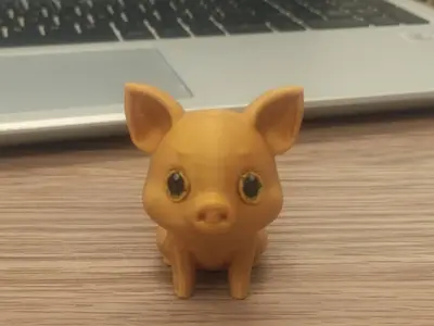 sitting golden pig