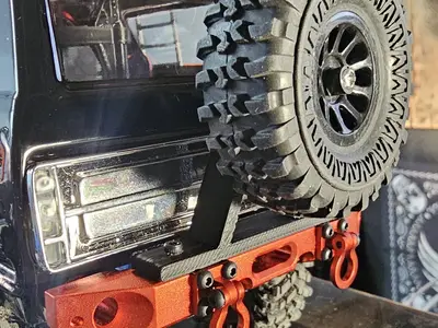 Rear bumper spare tire mount
