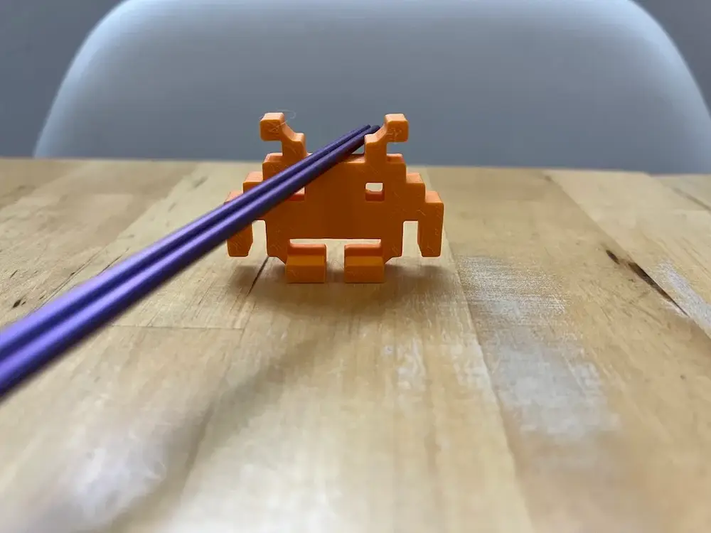 Space invader chopstick holder.