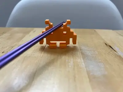 Space invader chopstick holder.