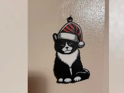 Gato Esmoquin con Adorno de Gorro de Santa
