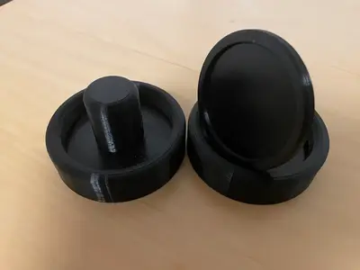 Air-hockey paddles and puck