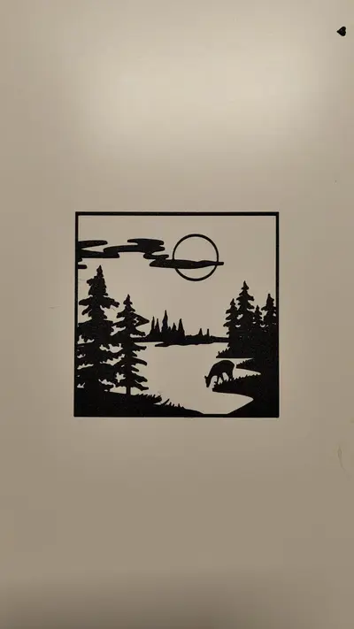 deer in lake landscape