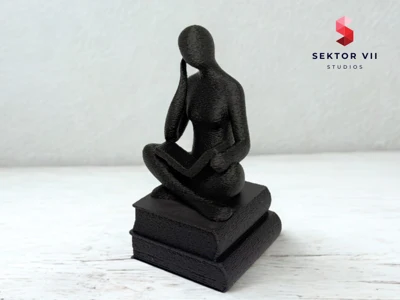ABSTRACT SCULPTURE - THINKING PERSON ON BOOKS