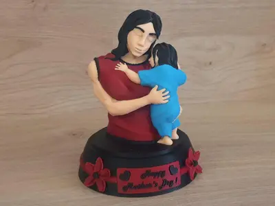 Statue for the Mother day , hugging her child