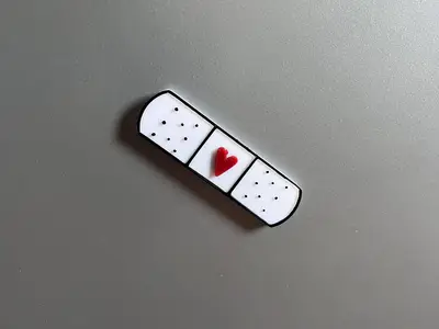 Bandaid fridge magnet