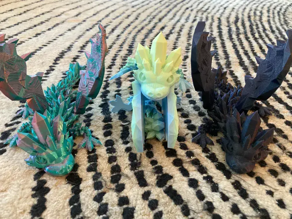 Articulated baby dragon desk toy