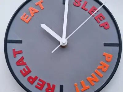 Eat Sleep Print Repeat Clock