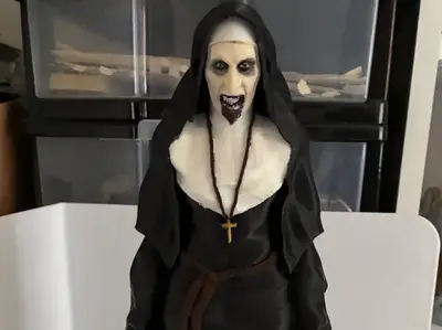 The nun screaming