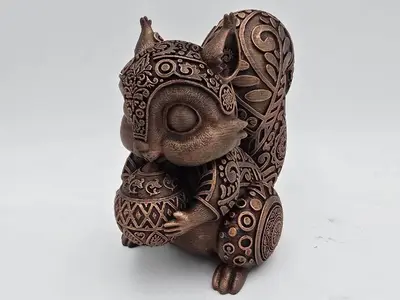 SQUIRREL ORNAMENTAL FIGURINE