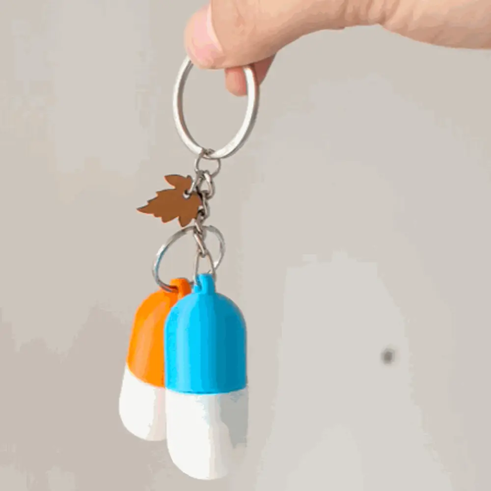 Portable Capsule Storage Keychain