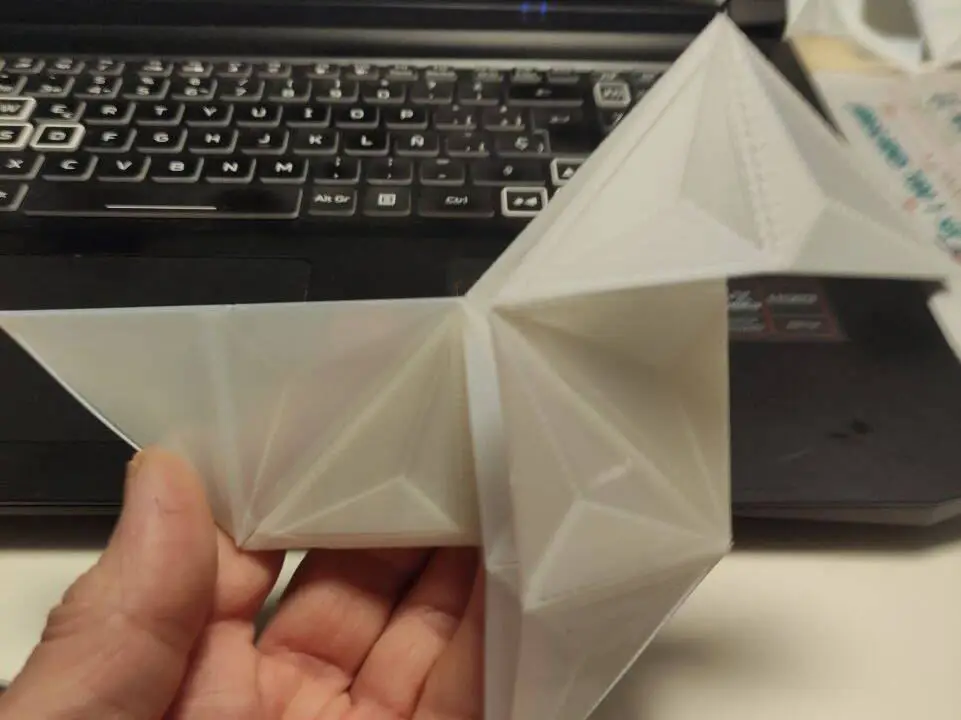 Pre-punched paper for origami