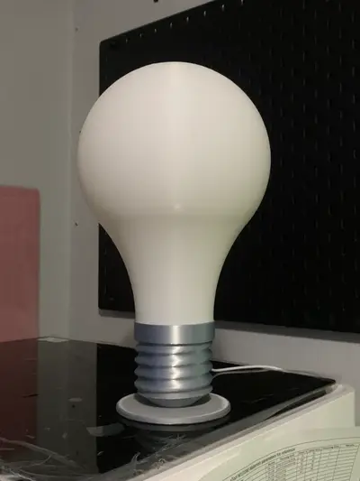 Light bulb shaped desk lamp