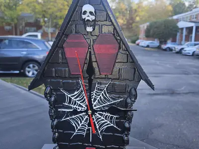 The Haunted hourglass (horror wall clock)