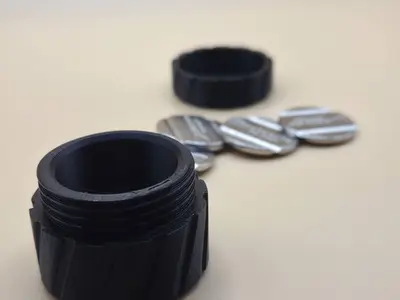 Tire-style coin container