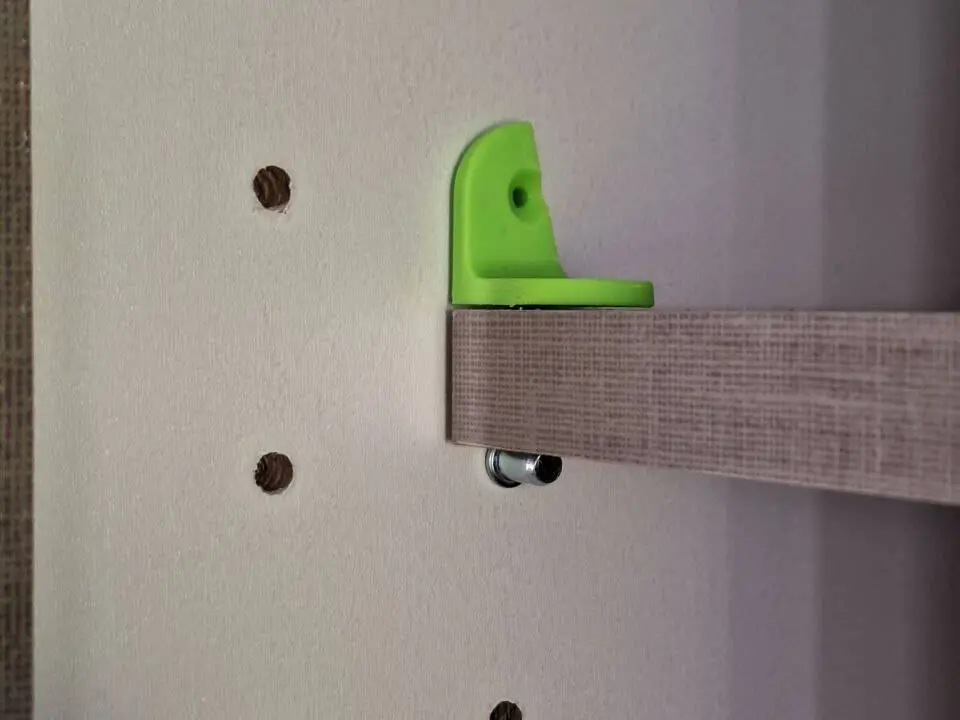 Shelf board retainer