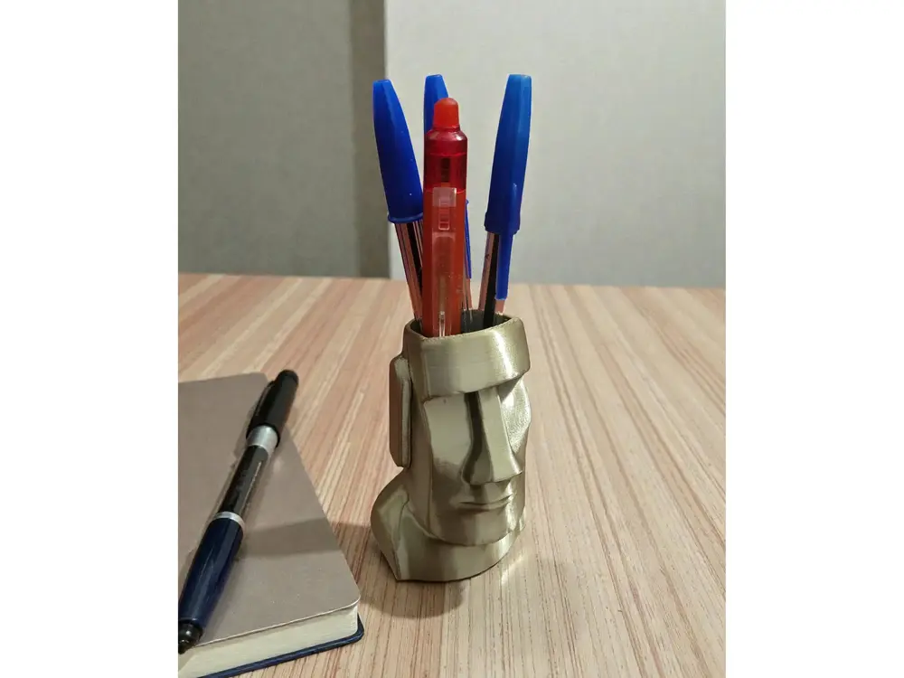 Moai face pen holder