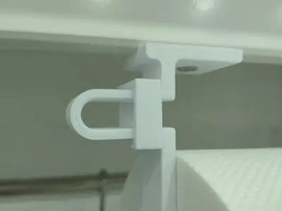 Clip for paper towel holders