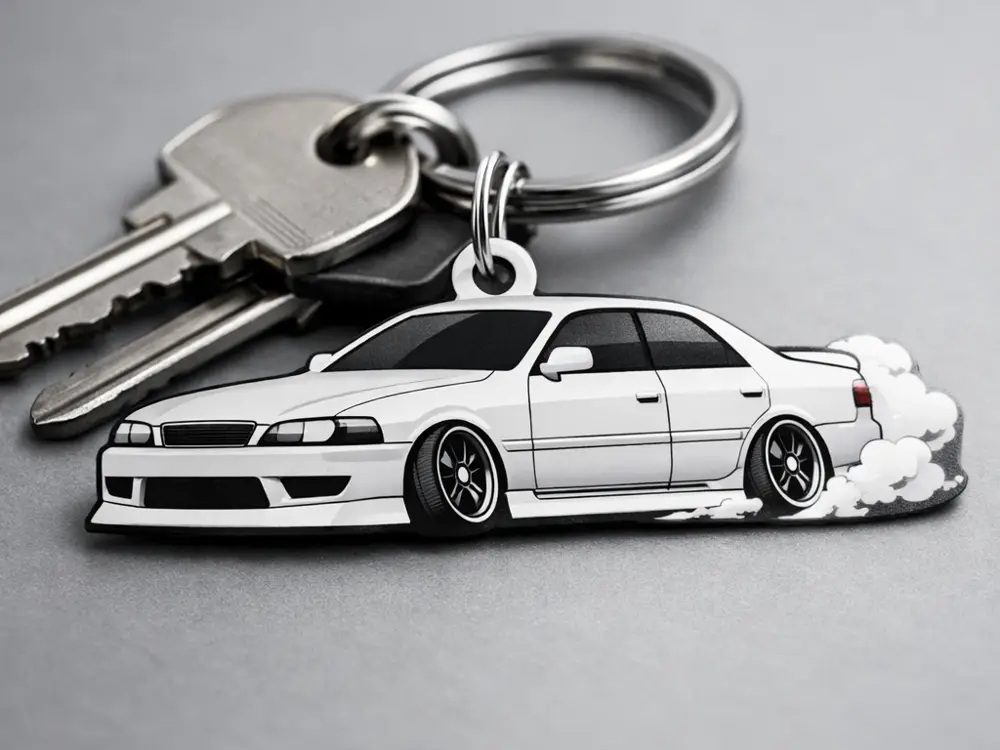 Schlüsselanhänger in Form eines Toyota Chaser JZX100 am Driften
