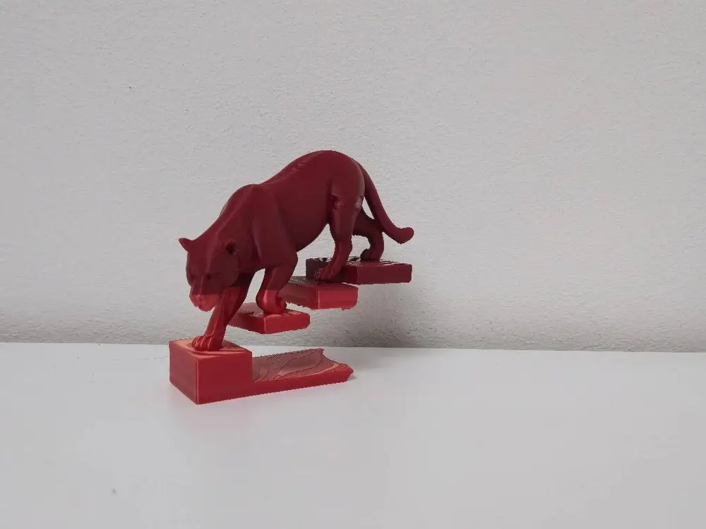 Red Cougar on Floating Stairs Statue