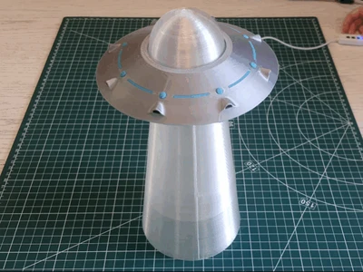 Night light in the form of a UFO