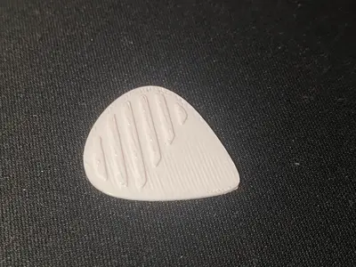 Guitar skarfin pick with grip