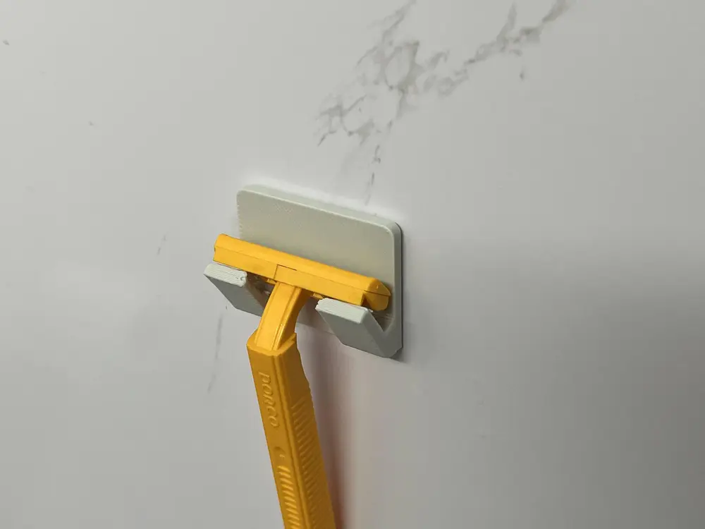 wall-mounted razor holder