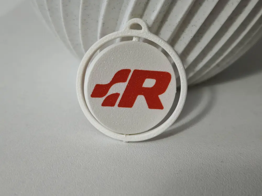 R Line spinning keychain