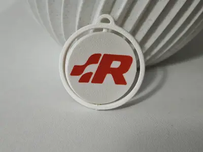 R Line spinning keychain