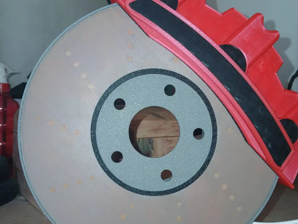 Glowing brake disc-shaped lamp