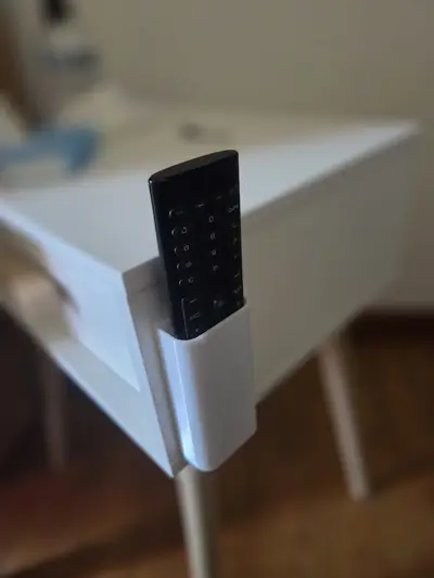 📺 Sleek Bedside Remote Holder (Tape-On)