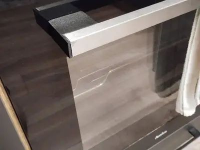 Oven handle plastic element
