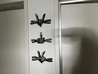 Barbed wire hand gesture wall art decoration