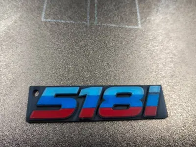 Llavero con insignia BMW 518i M/power