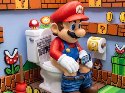 Plumber's Break: Mario on the Toilet Phone Stand